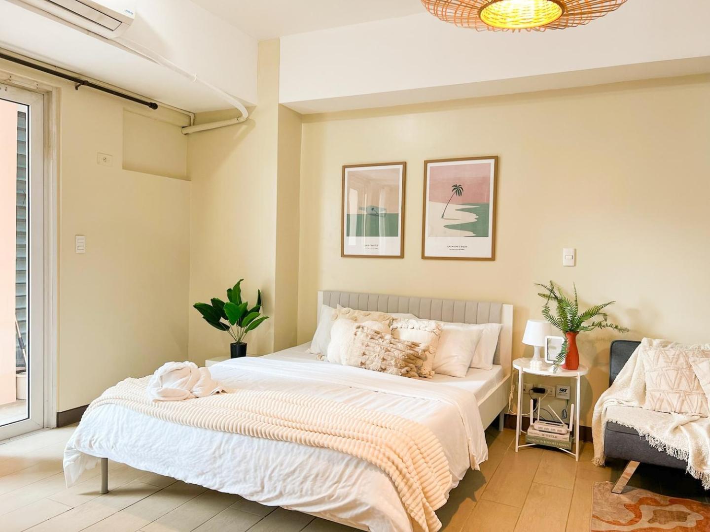 Bahay bakasyunan Cozy Bgc Condo, Venice Grand Canal #vlrtc18e Manila